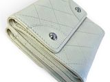 wallet on a white background with a diamond pattern on the front