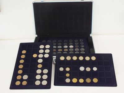 an image of a case with a lot of coins inside of it