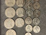 a lot of coins that are sitting on a table