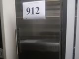 a stainless steel refrigerator that has a price tag on it