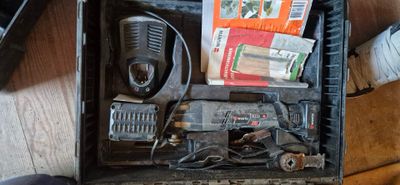a black case with a radio and other items in it