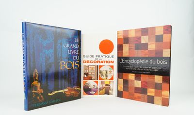 three books that are sitting next to each other on a table