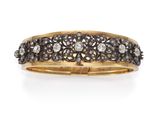 un bracelet rigide en or et diamants