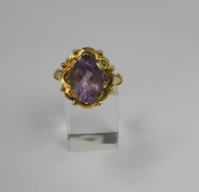 a gold ring with an amethorated amethorated amethorated amethorated amethorated amethorated amethora