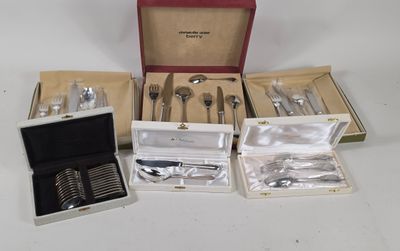 a box with silverware in it on a table