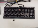 a keyboard and a mouse sitting on a desk next to a box