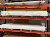 a rack with several different types of surfboards on it