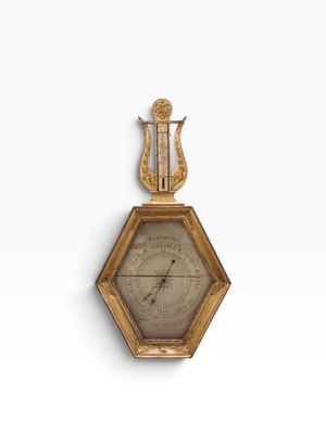 an image of a clock mounted to the side of a wall