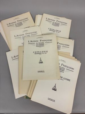 a lot of papers sitting on a table with a clock in the background