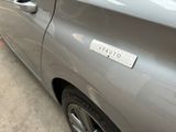 a car that has a sticker on the side of it