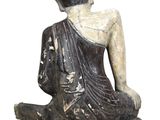 statue of a person sitting on a rock with a white background