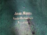 a close up of a green shirt with writing on it