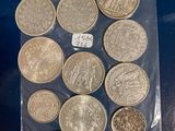 a lot of coins in the bag on the table