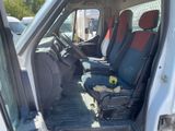 an image of a van with seats and a bag in the back