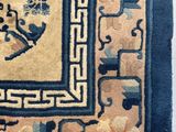 a rug with a picture of a bird and a flower on it