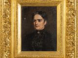 portrait of a gentleman in a black coat and a gold frame