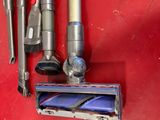 a red wall with a bunch of different tools on it