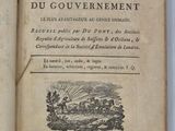 un livre ouvert sur lequel figure l'image d'un homme dans un champ