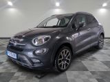 the grey fiat suv is parked on a checkered floor