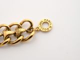 an image of a close up of a chain on a white surface