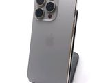 a close up of a cell phone with a camera attached to it