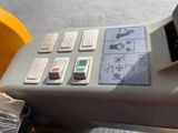 a close up of a machine with buttons on it