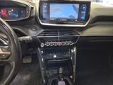 the interior of a car with a steering wheel, dashboard, and dash board