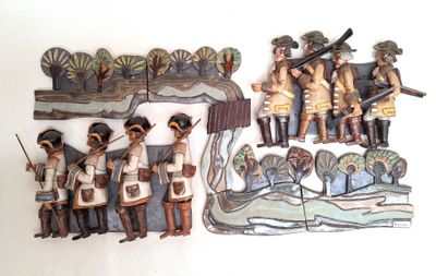 a group of figurines that are on the wall