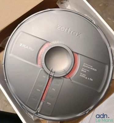 une boîte contenant un CD qui se trouve dans la boîte