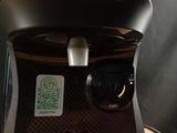 a coffee maker that is sitting on a table