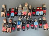 a lot of toy figurines that are sitting on a table