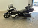 a motorcycle that is parked in a garage