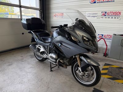 a motorcycle that is parked in a garage