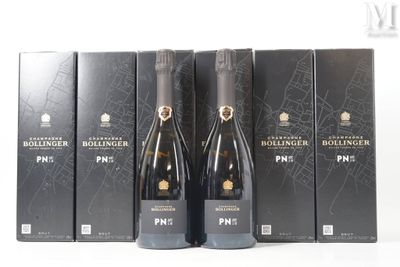 trois bouteilles de champagne posées côte à côte sur une table