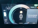 the dashboard of a car with a digital display showing the speed of the car