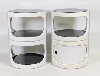 two white tables with black tops on a white background