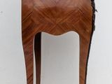 an image of a small wooden table with a marble top