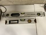 two tools that are laying on the floor