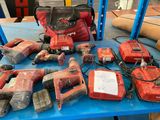 a lot of power tools that are on a table