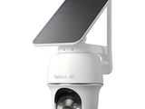 an image of a solar powered security camera mounted on the side of a building