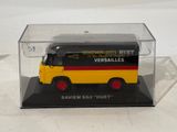 a yellow and black bus in a clear box