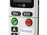 a close up of a cell phone with a note on it