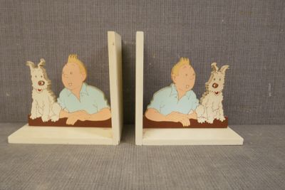 TINTIN - Paire de serre-livres en bois découpé.