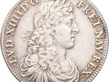 a close up of a coin on a white background