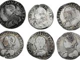 six pièces de monnaie romaines antiques représentant des têtes d'hommes et de femmes