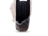 a close up of a car tire wrapped in plastic on a white background