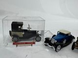 two toy cars that are sitting in a clear box