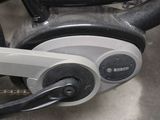 a close up of a bicycle with a chain attached to it