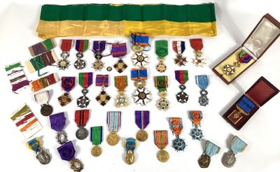 a lot of medals and medals on display on a table