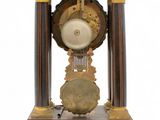 a clock that is sitting on top of a table